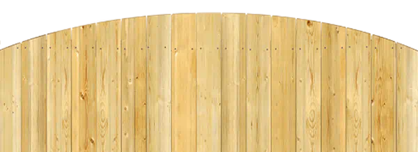 Close-up of a wood fence with a convex top where the pickets rise up in a smooth arch toward the center of each section